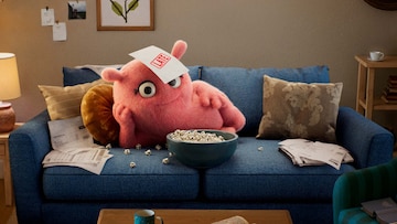 Credit Wrecker: Miss Payment lounging on the couch